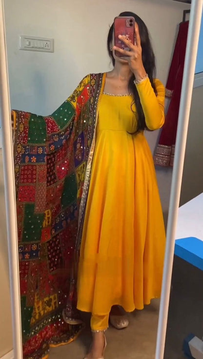 Yellow satin plain anarkali suit with printed dupatta