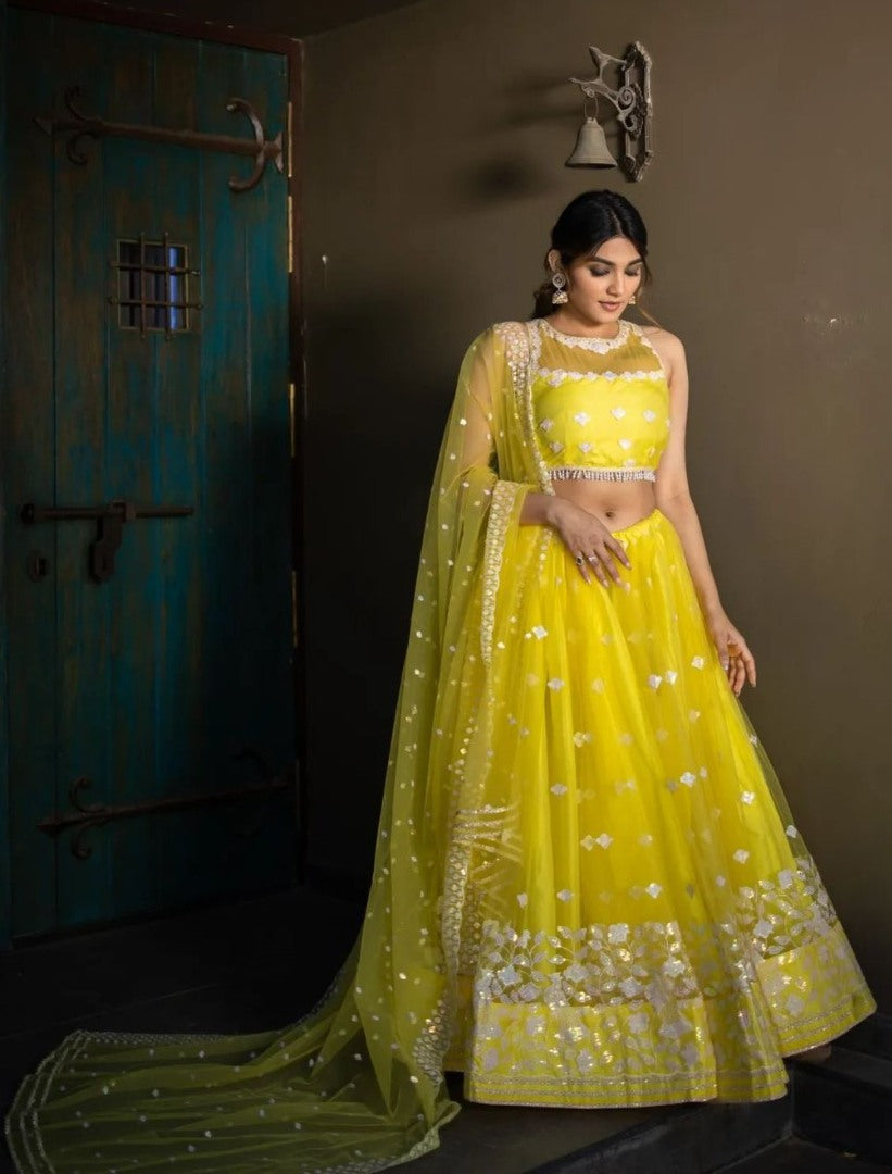 Yellow soft net sequence and thread embroidery work lehenga choli for ceremony