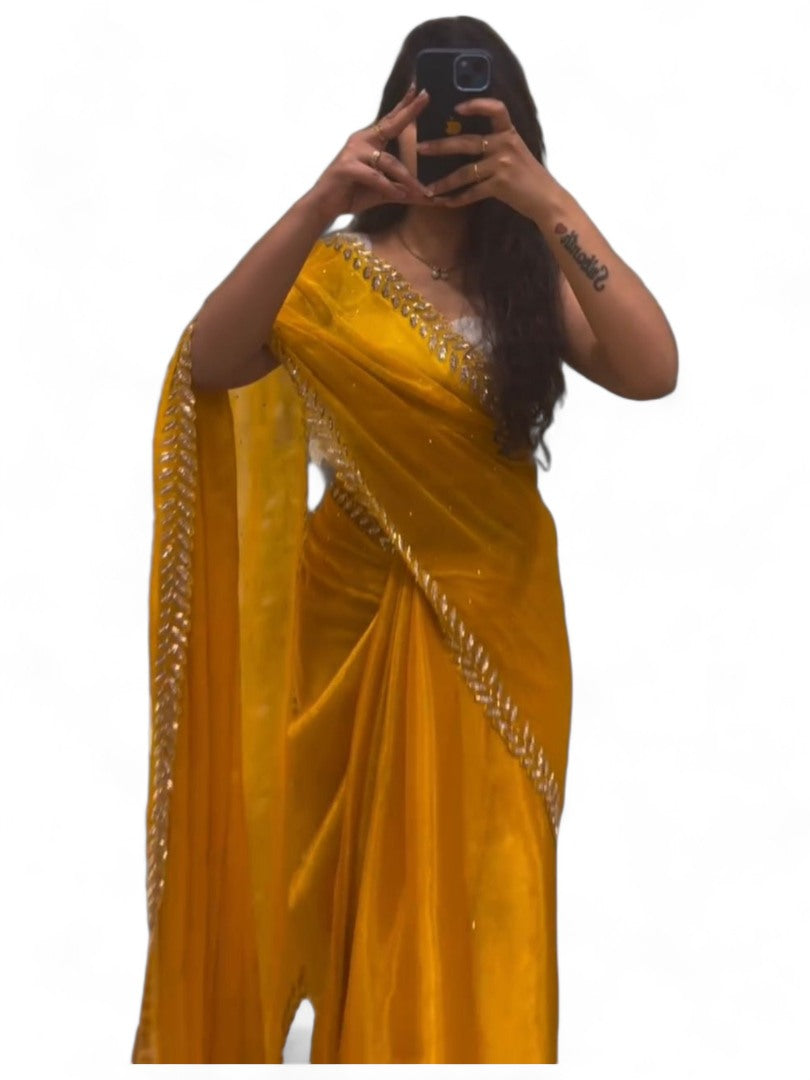 Yellow stylish fancy party wear saree