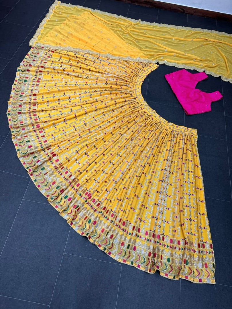 Yellow tapeta silk heavy embroidery work lehenga choli for haldi ceremony