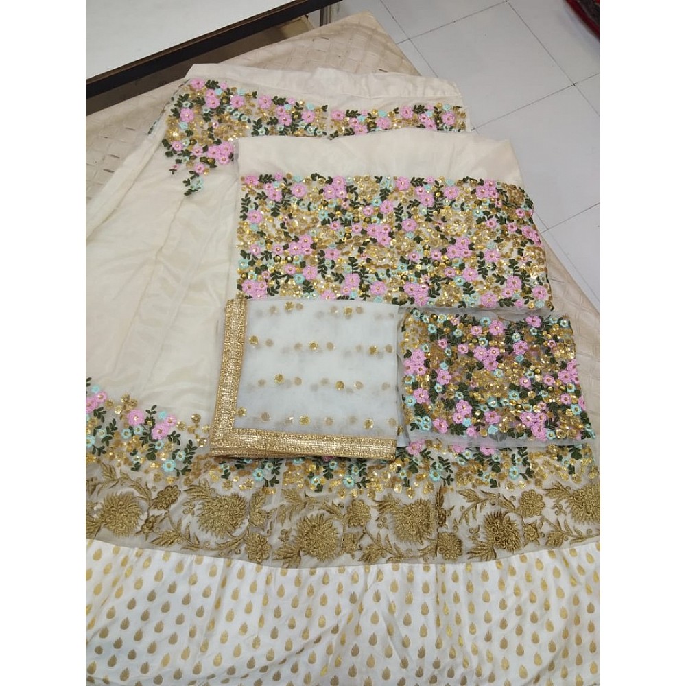 Cream net with cancan net embroidered wedding lehenga