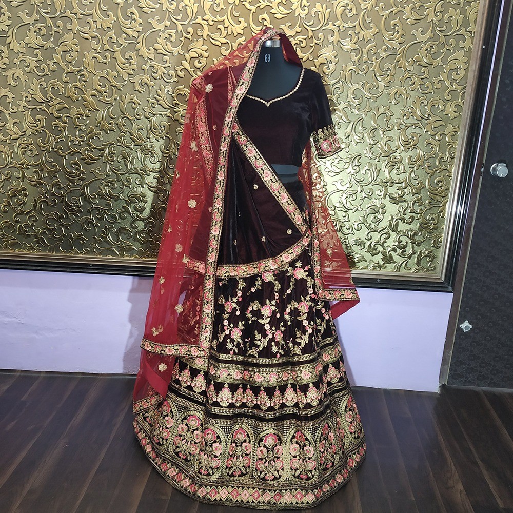 Maroon heavy velvet designer embroidered bridal lehenga with can can net