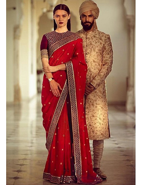 Designer royal look embroidered red saree