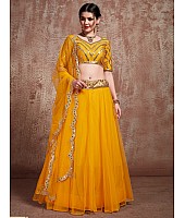 Yellow soft silk ceremonial lehenga choli with mirror work blouse
