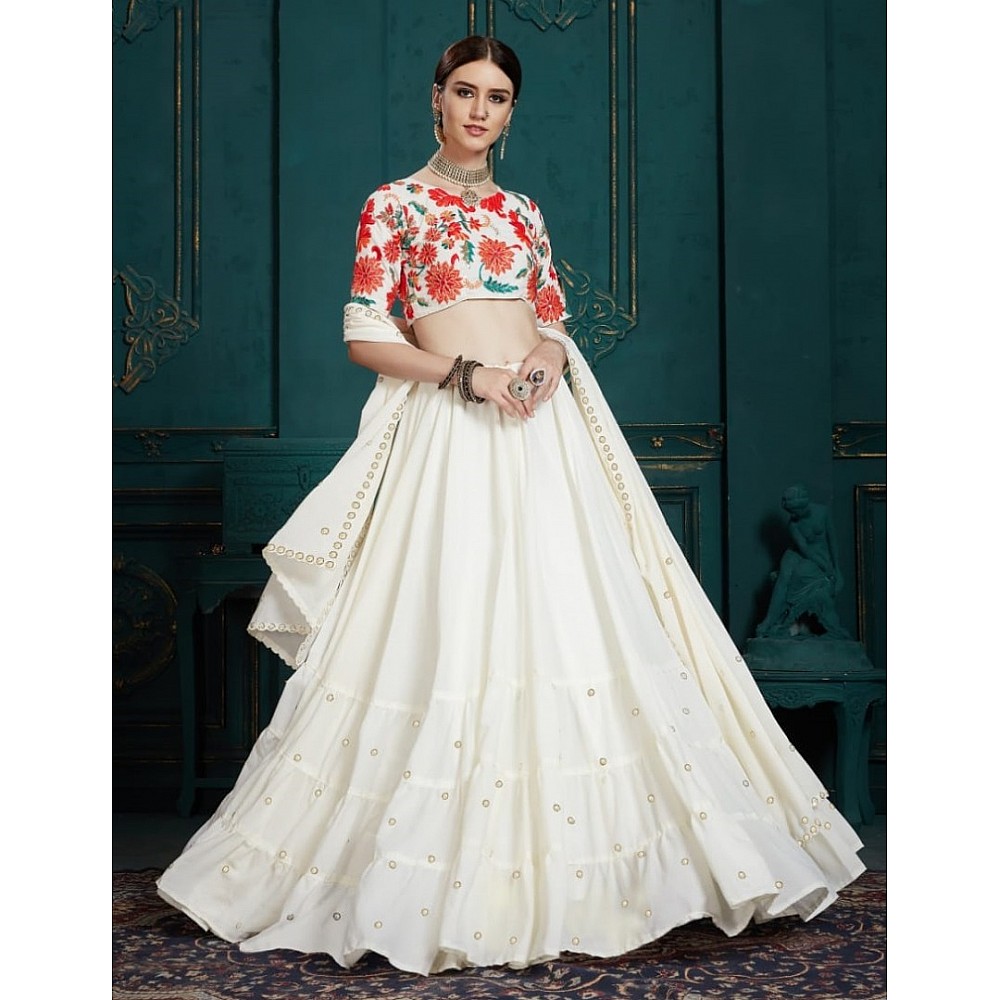 White georgette ruffle lehenga with embroidered blouse