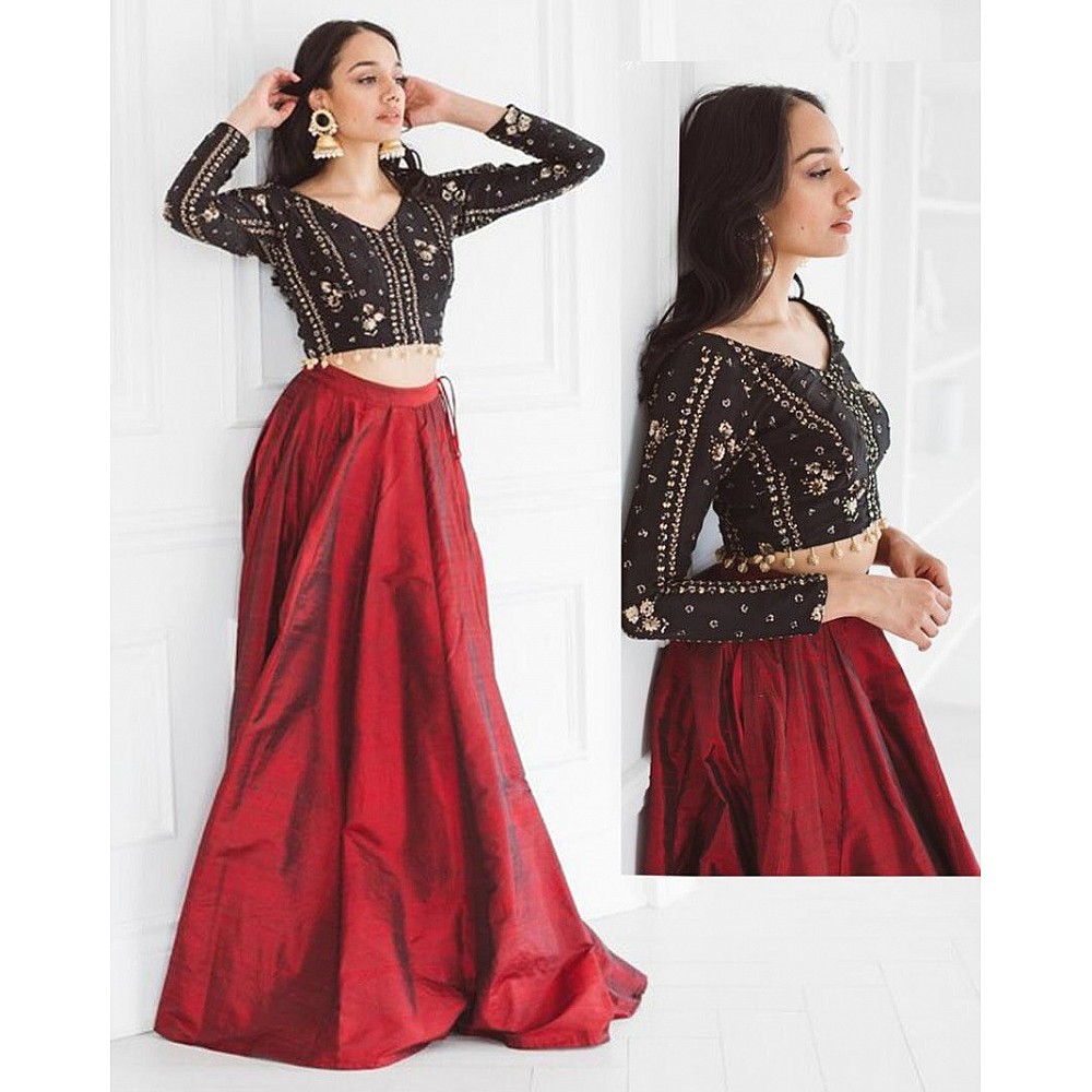 Red tapeta silk partywear lehenga with embroidered blouse