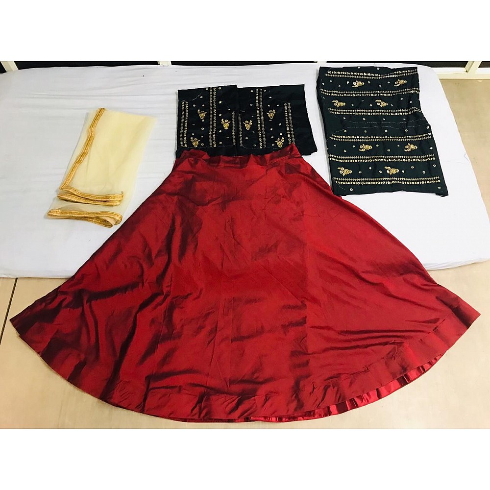 Red tapeta silk partywear lehenga with embroidered blouse