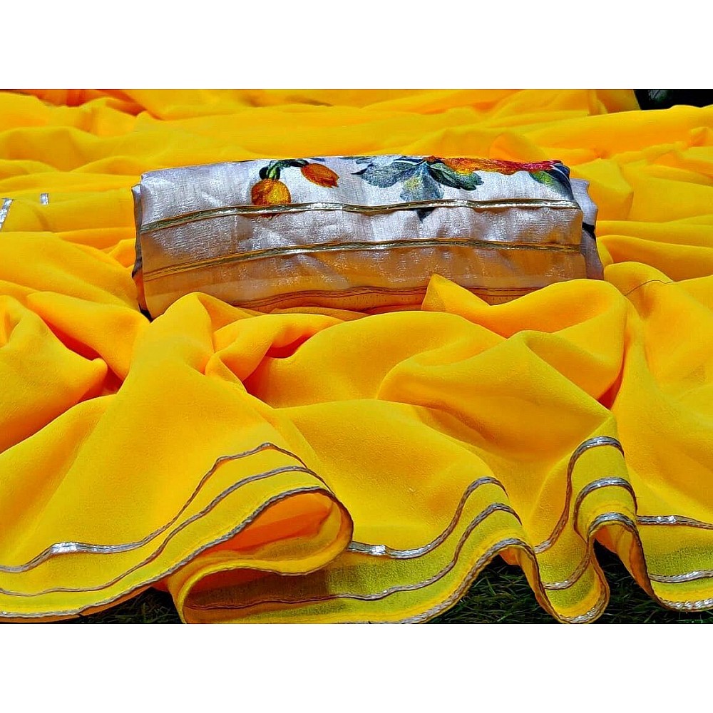 Yellow moss georgette plain saree with floral printed blouse