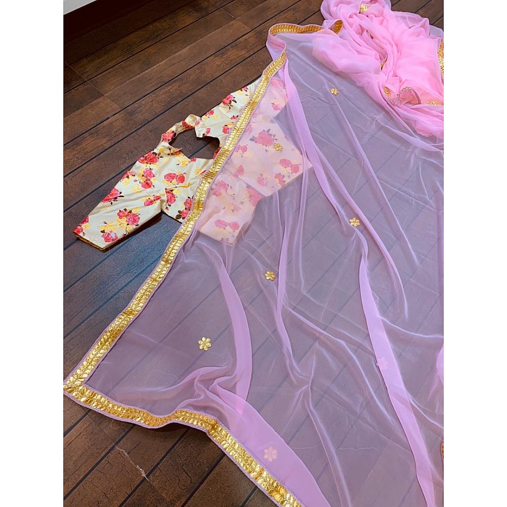 Baby pink georgette saree with floral printed blouse