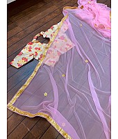 Baby pink georgette saree with floral printed blouse
