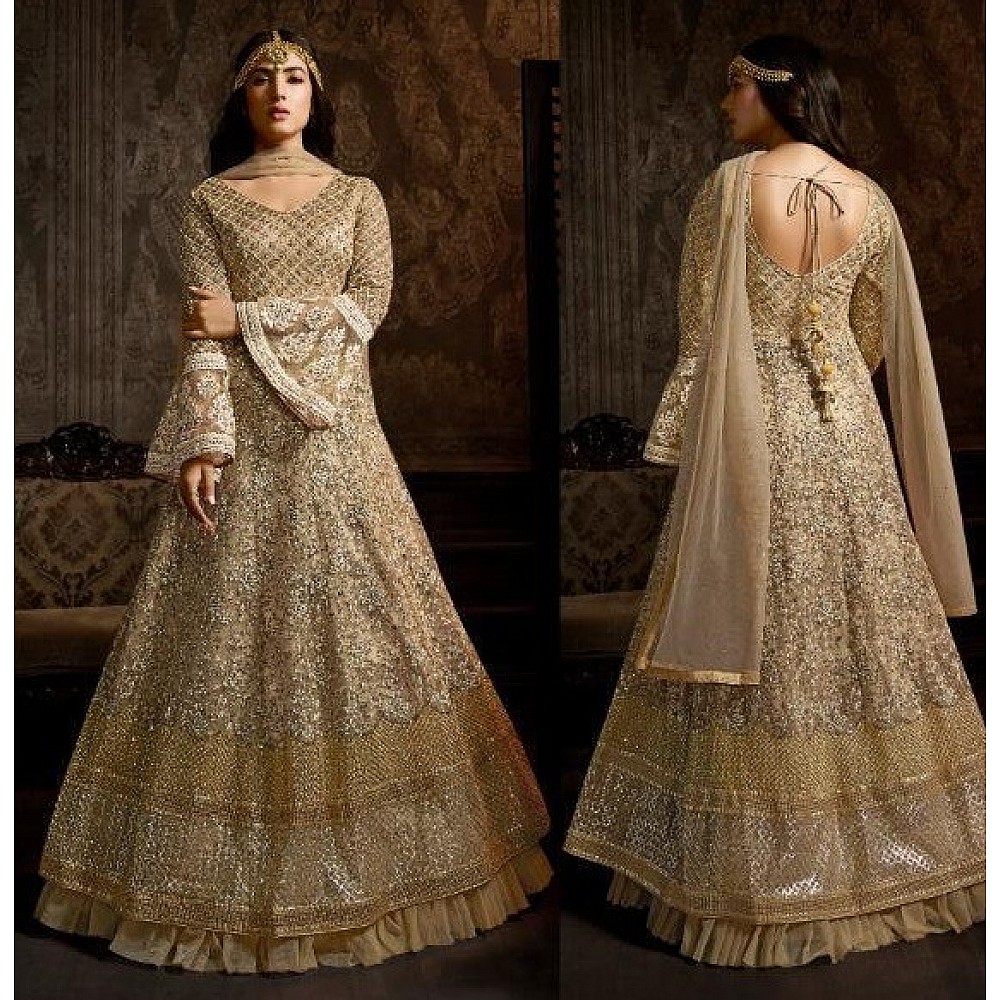 Beige net heavy embroidered designer wedding gown with dupatta