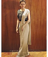 Cream georgette designer ruffle saree with handwork blouse