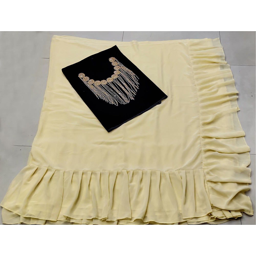 Cream georgette designer ruffle saree with handwork blouse