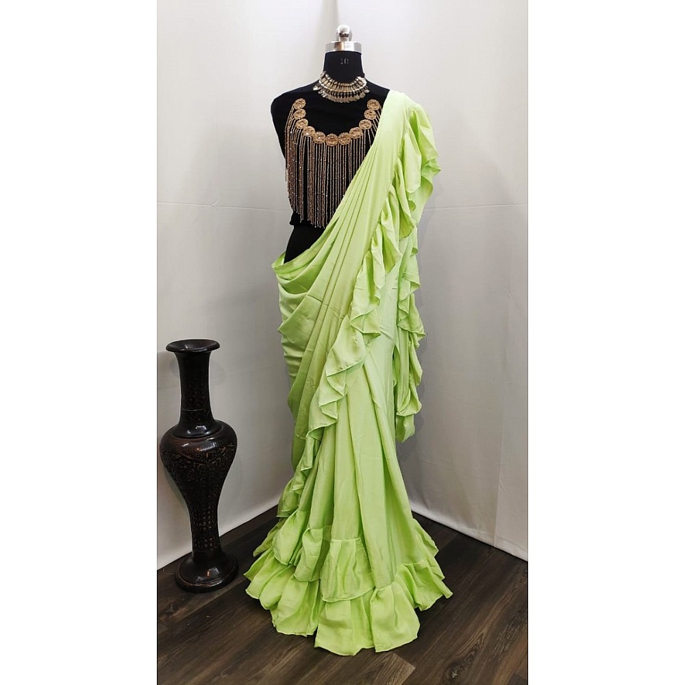 Pista green crepe silk designer ruffle saree with handwork blouse