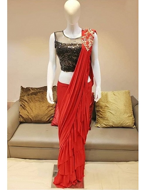 Red georgette glamorous partywear saree with black sequence work blouse 