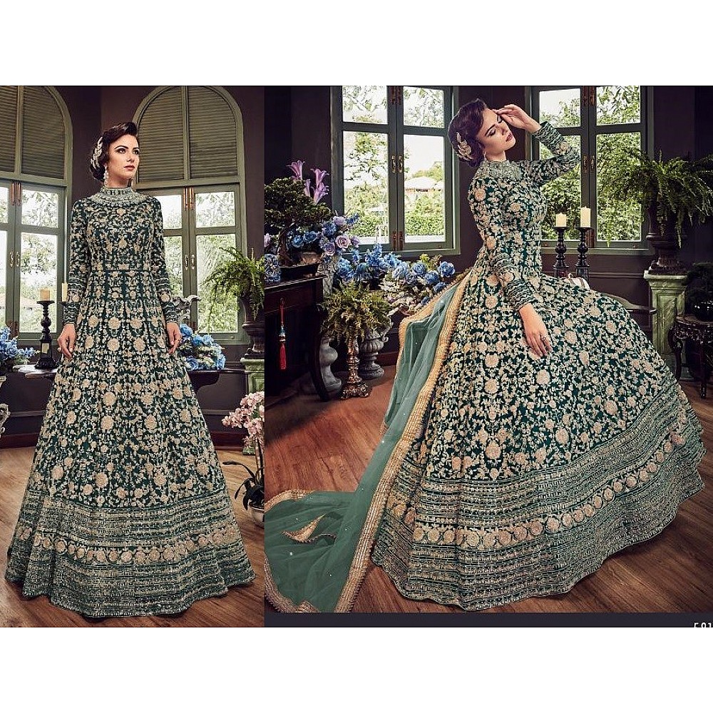 Green net heavy embroidered wedding gown