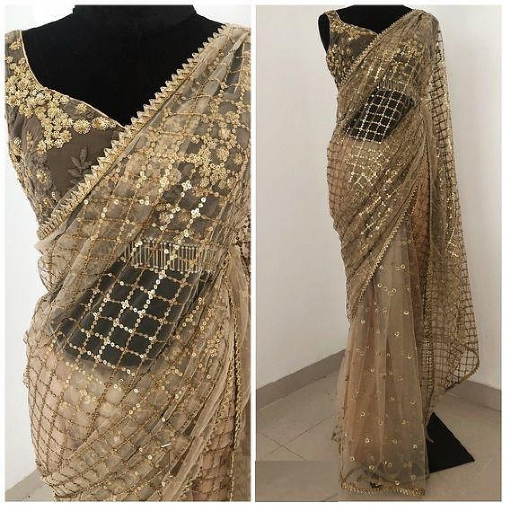 Beige net with heavy sequence work wedding saree