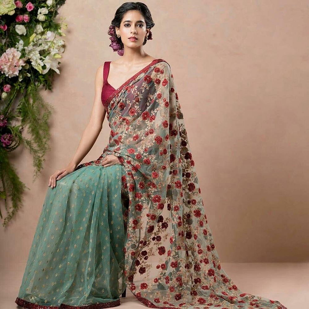 Sea green net sequence and embroidery worked wedding saree 
