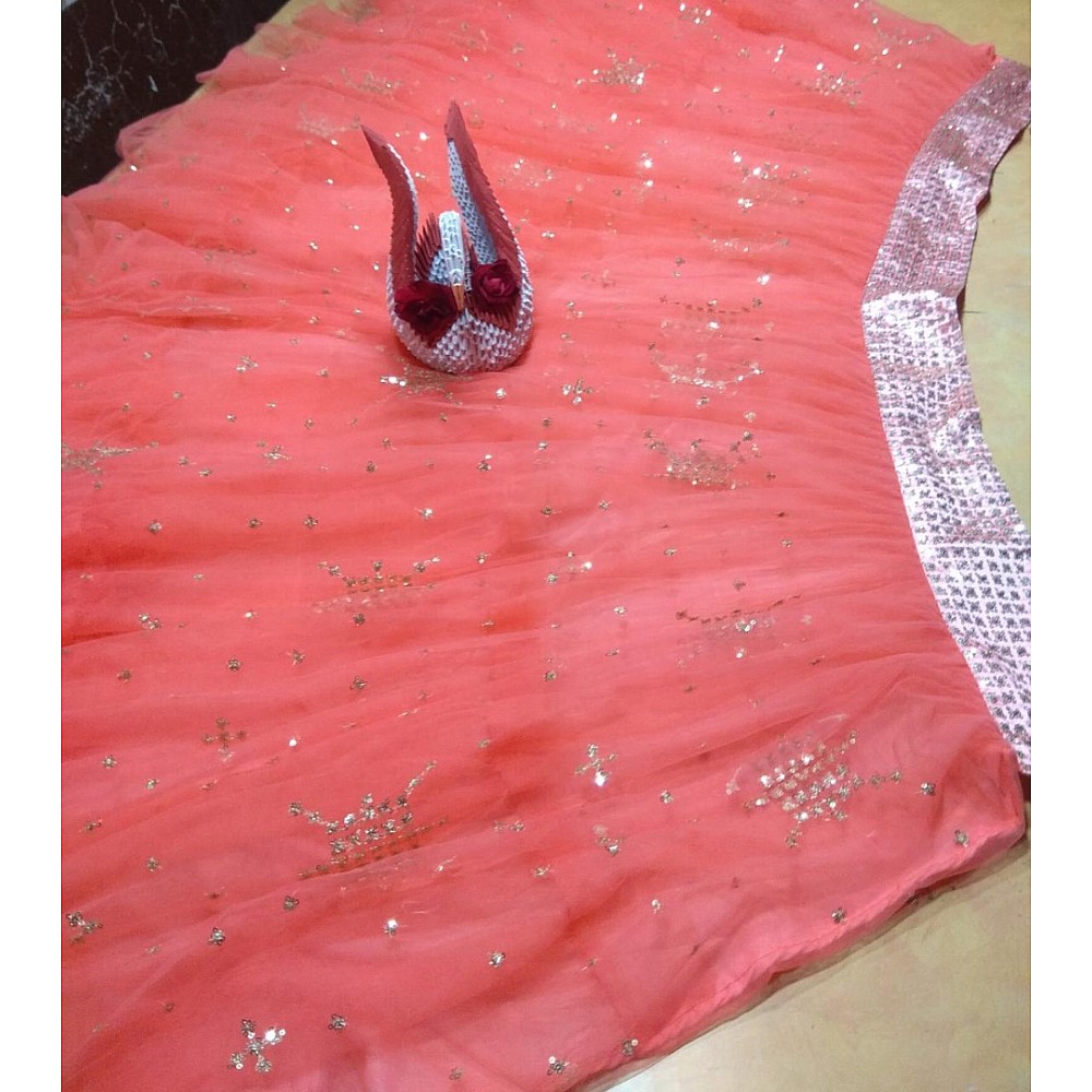 Peach soft net embroidered lehenga choli for ceremony