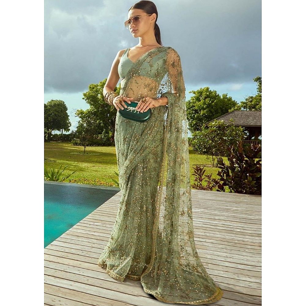 Pista green mono net fancy thread and sequence worked wedding saree