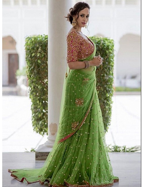 Trendy green embroidered mono net wedding saree