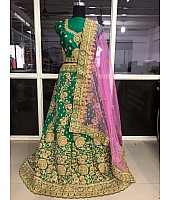 Green tapeta silk heavy embroidered bridal lehenga