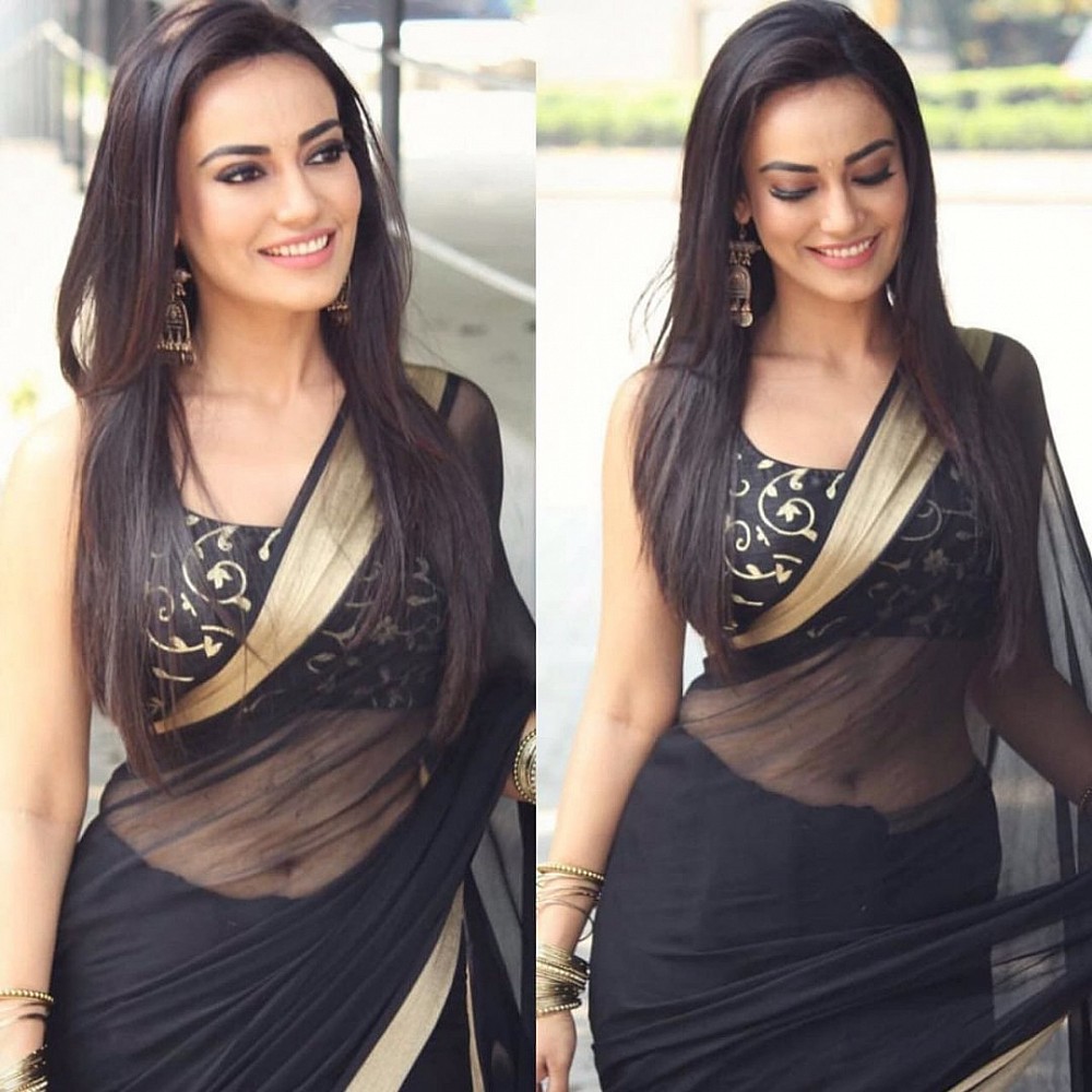 black georgette partywear saree with embroidered blouse