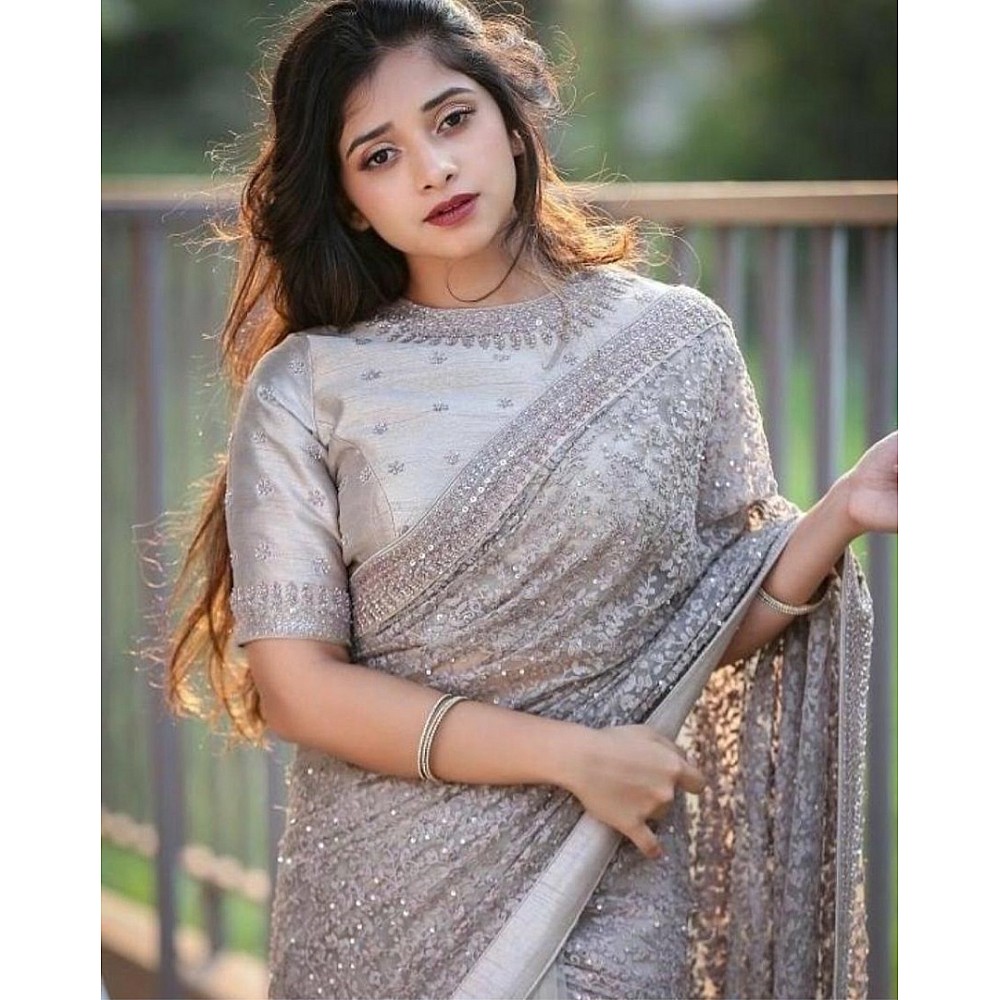 Grey net heavy embroidered and stone work wedding saree