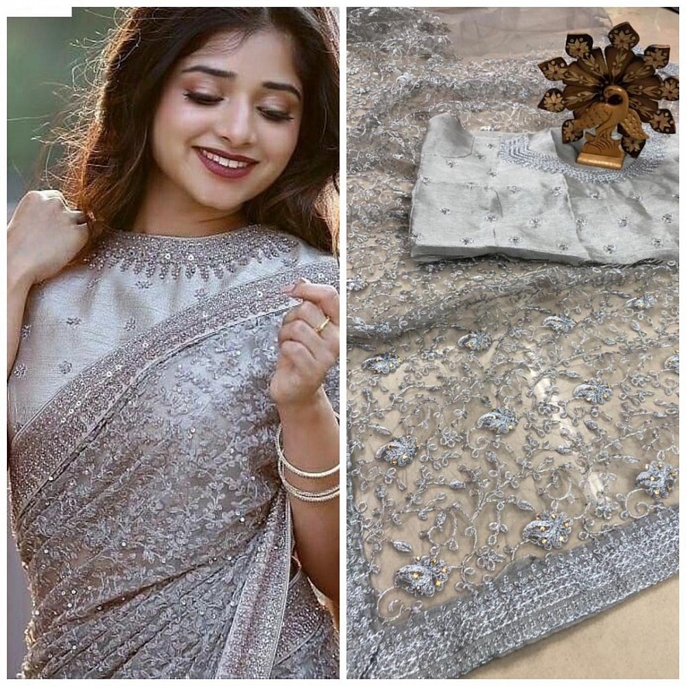Grey net heavy embroidered and stone work wedding saree