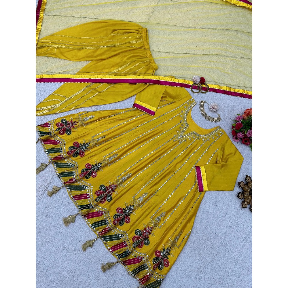 Yellow chinon silk heavy work dhoti suit