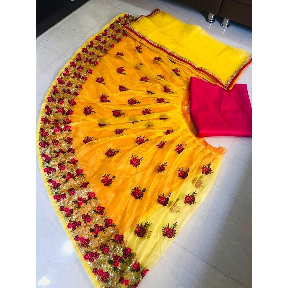 yellow net heavy embroidered wedding lehenga