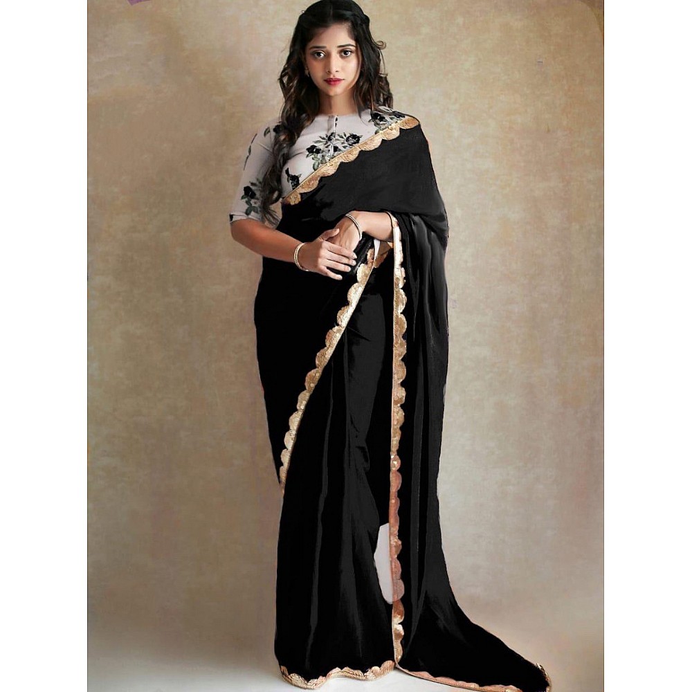 Black georgette partywear saree with sequence work gold border