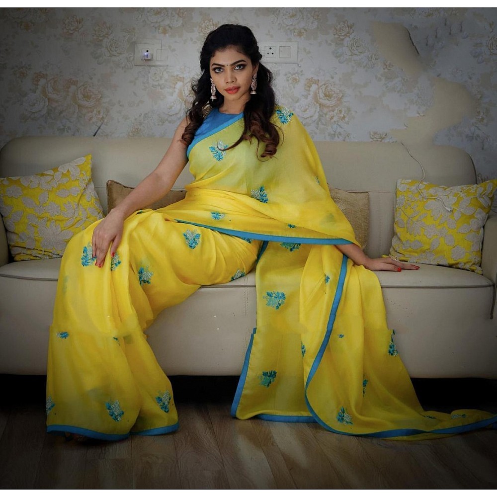 yellow georgette casual wear embroidered saree