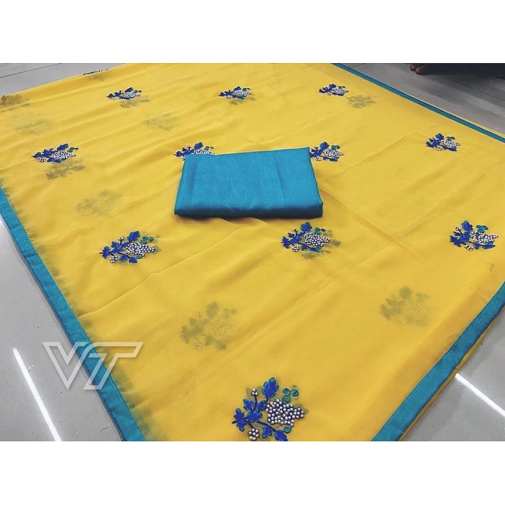 yellow georgette casual wear embroidered saree