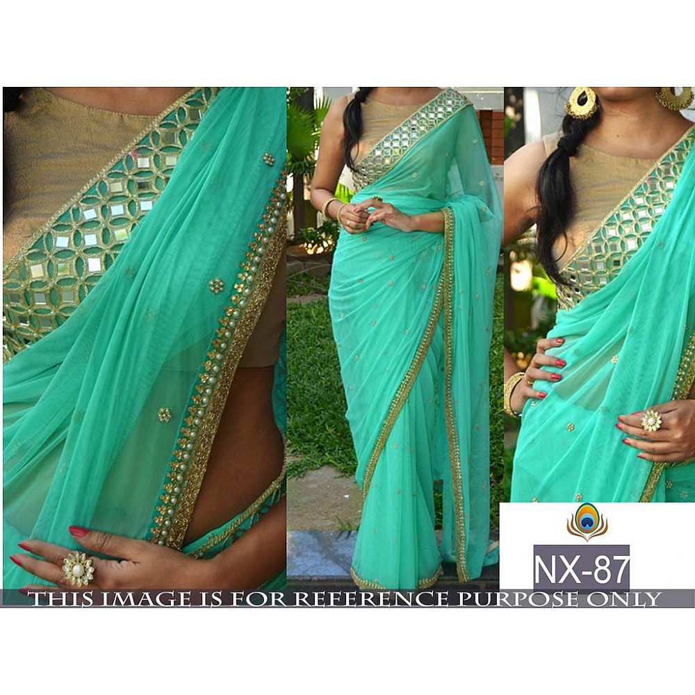 Beautiful embroidered sky green partywear saree