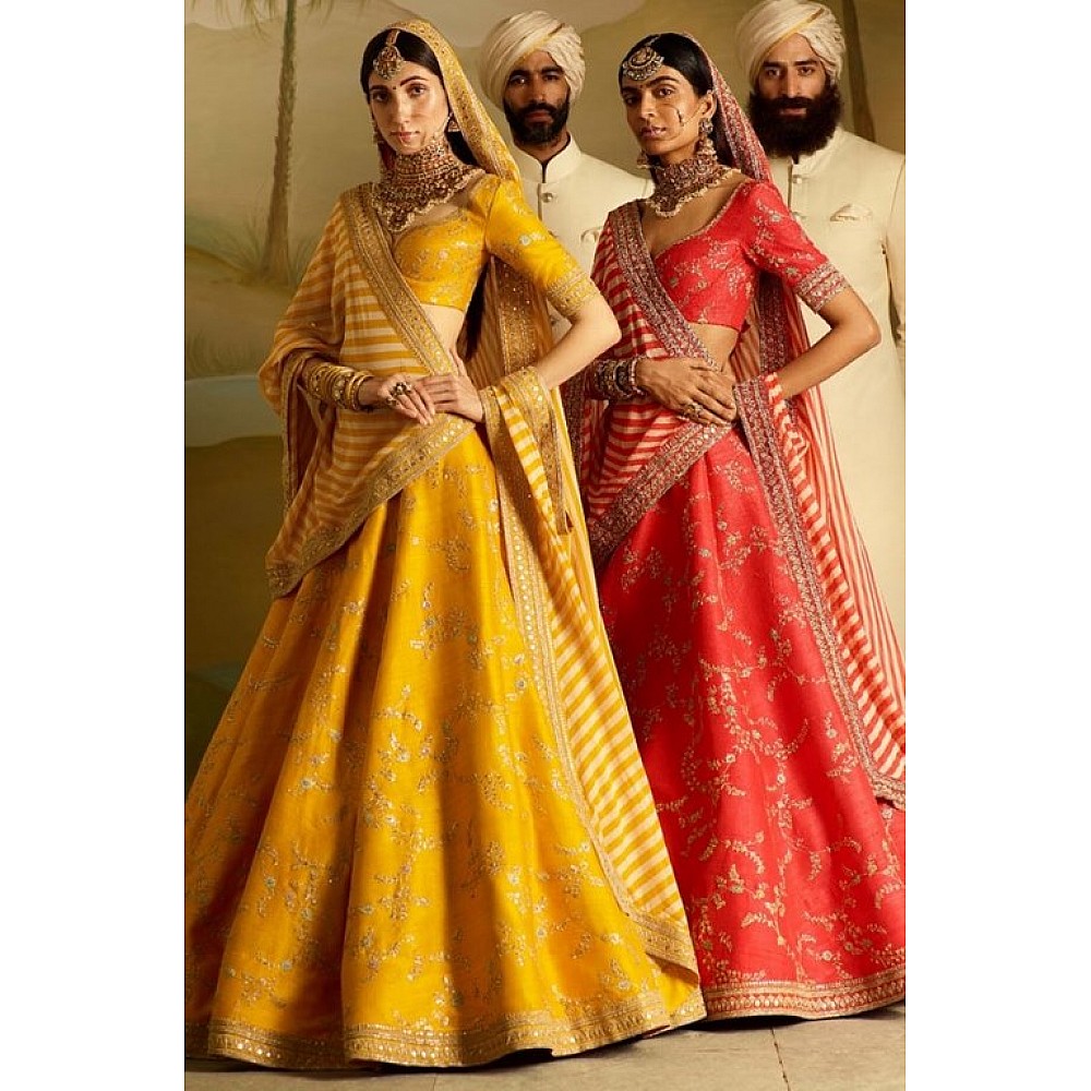 Designer red and yellow embroidered bridal ceremonial lehenga