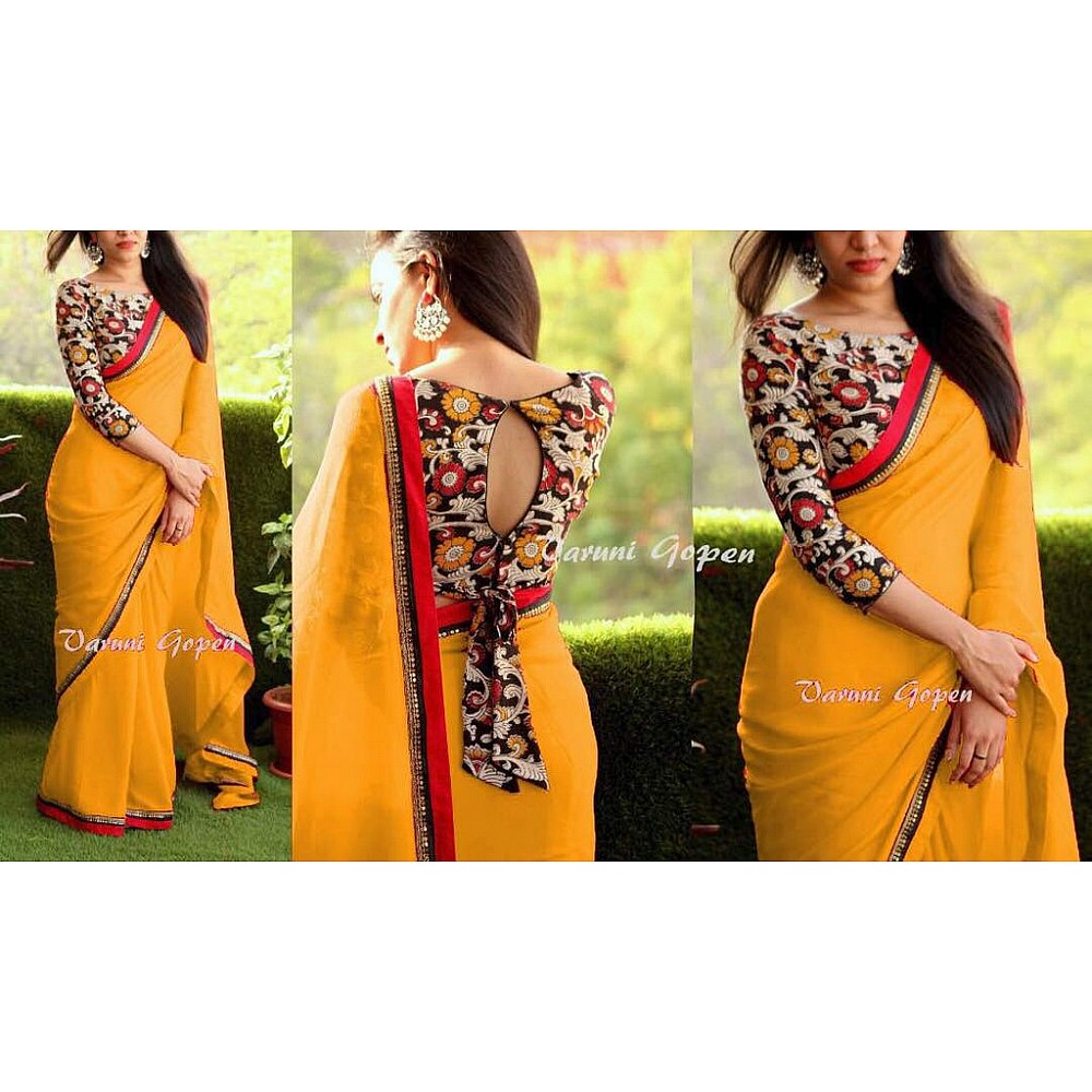 Gorgeous yellow partywear saree with fancy blouse