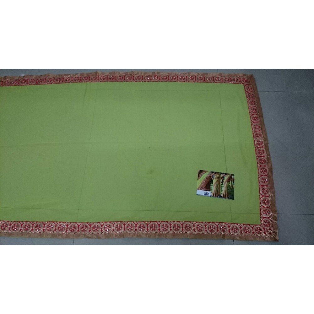 mahaveer parrot green ceremonial embroidered saree