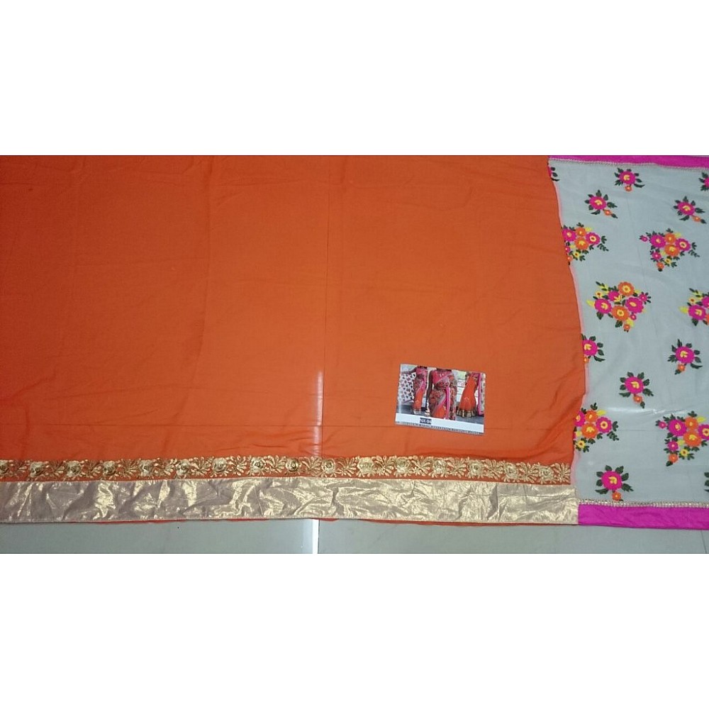 Mahaveer Designer embroidered cream and orange half half saree