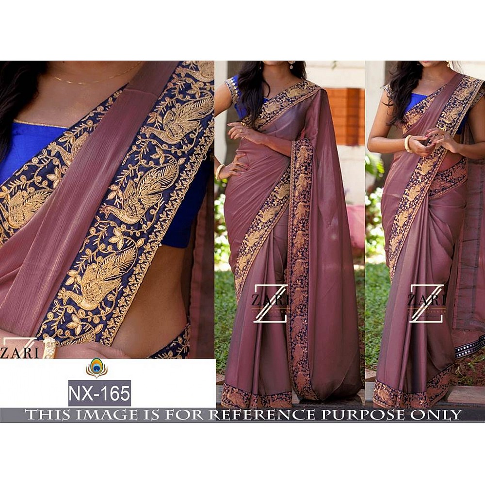 Mahaveer embroidered purple saree