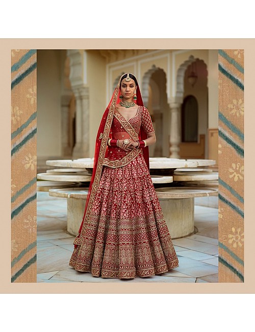 Pink floral embroidery on red base art silk bridal lehenga