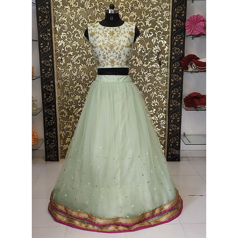Pista green net sequence work lehenga with embroidered crop top