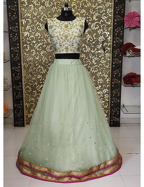Pista green net sequence work lehenga with embroidered crop top