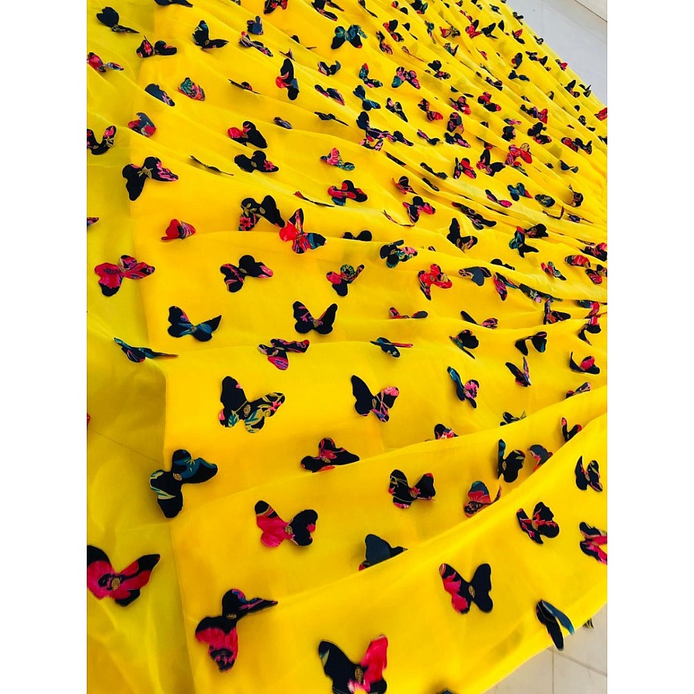 Yellow georgette butterfly embelished crop top lehenga