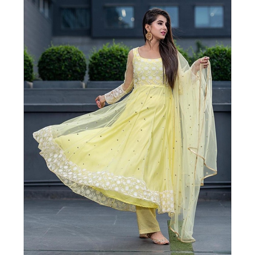 Yellow net thread embroidered anarkali suit