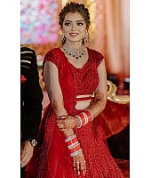 Red heavy embroidered sequence worked wedding lehenga choli