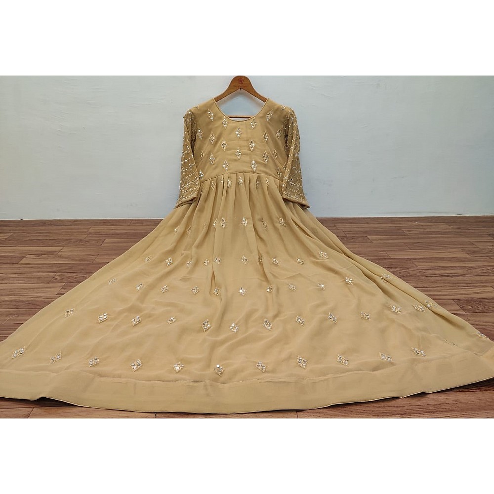 Beige georgette embroidered and mirror work gown