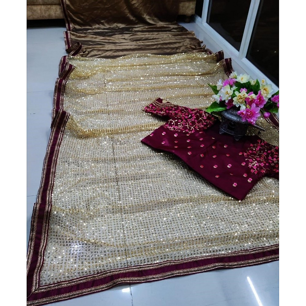 Golden heavy nylon butterfly net sequence zari work ceremonial saree