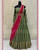 Green georgette embroidered gown for wedding