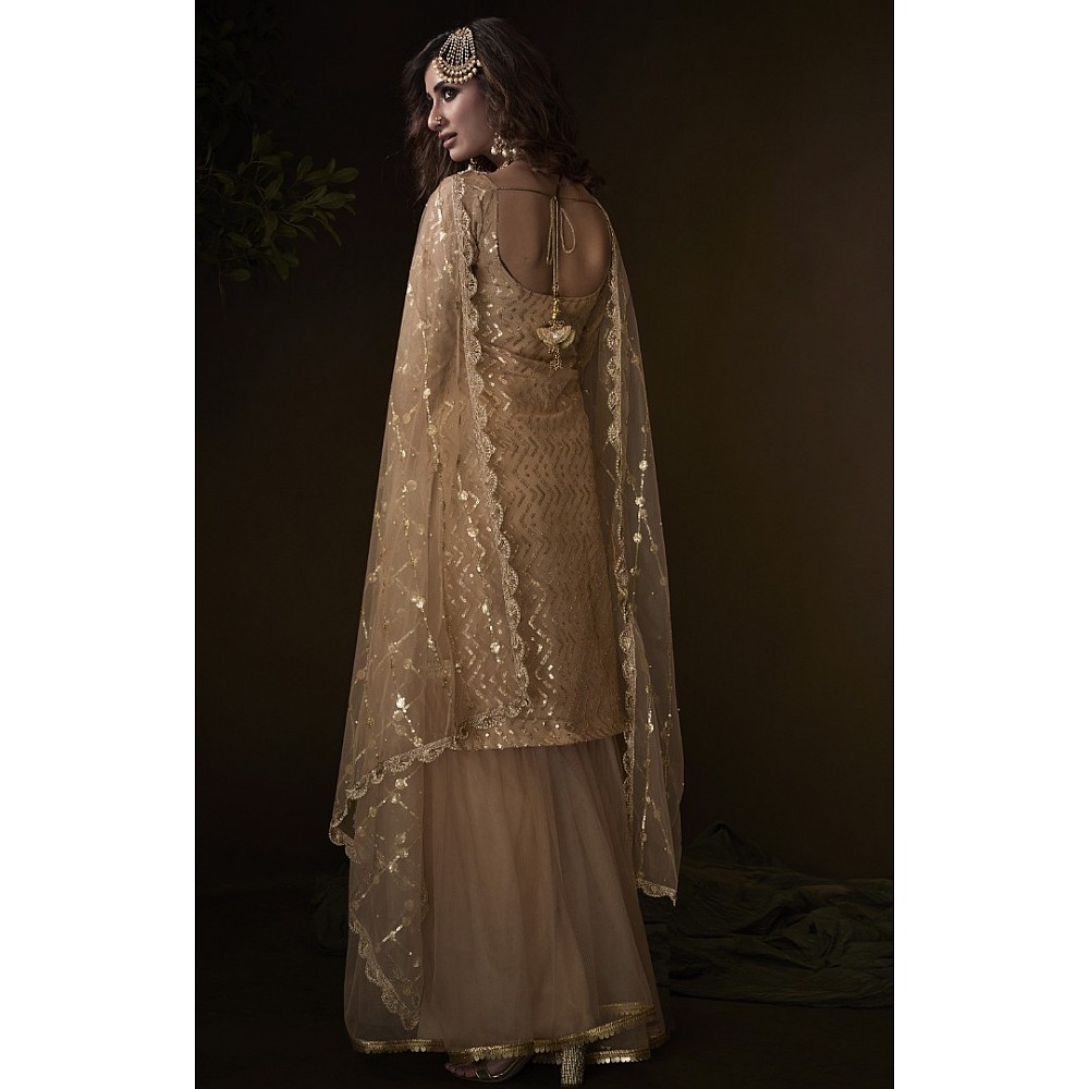 Light brown soft net sequence work ceremonial sharara salwar suit